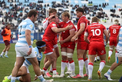 110726 - Argentina v Wales - Nations Championship - Dewi Lake of Wales celebrates scoring a try with team mates