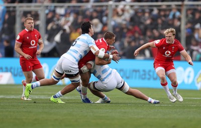 110726 - Argentina v Wales - Nations Championship - Joe Hawkins of Wales is tackled by Santiago Grondona and Joaquin Oviedo of Argentina 