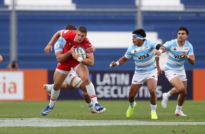 110726 - Argentina v Wales - Nations Championship - Joe Hawkins of Wales is tackled by Guido Petti of Argentina 