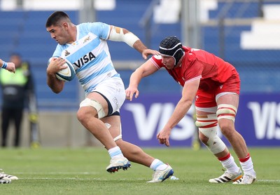 110726 - Argentina v Wales - Nations Championship - Joaquin Oviedo of Argentina is challenged by Adam Beard of Wales 