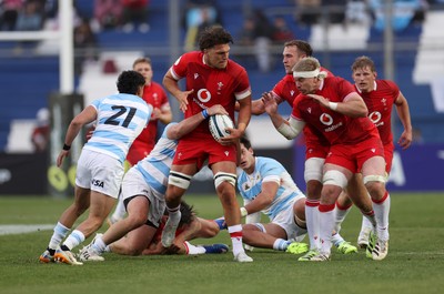 110726 - Argentina v Wales - Nations Championship - Teddy Williams of Wales looks to offload the ball