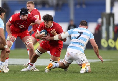 110726 - Argentina v Wales - Nations Championship - Teddy Williams of Wales is tackled by Marcos Kremer of Argentina 