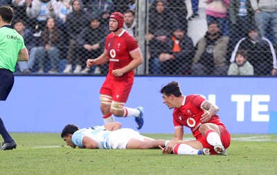 110726 - Argentina v Wales - Nations Championship - Louis Rees-Zammit of Wales is taken out by Santiago Carreras of Argentina 