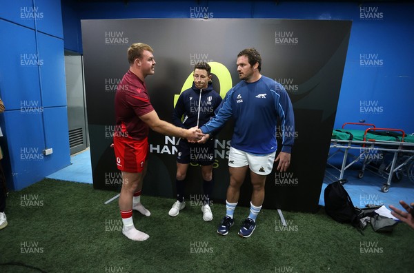 110726 - Argentina v Wales - Nations Championship - Dewi Lake of Wales and Julian Montoya of Argentina with Referee Paul Williams at the coin toss
