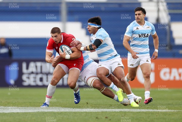 110726 - Argentina v Wales - Nations Championship - Joe Hawkins of Wales is tackled by Guido Petti of Argentina 