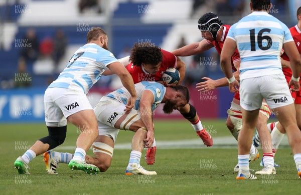 110726 - Argentina v Wales - Nations Championship - Kane James of Wales is tackled by Marcos Kremer of Argentina 
