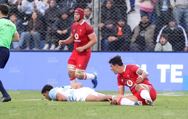 110726 - Argentina v Wales - Nations Championship - Louis Rees-Zammit of Wales is taken out by Santiago Carreras of Argentina 
