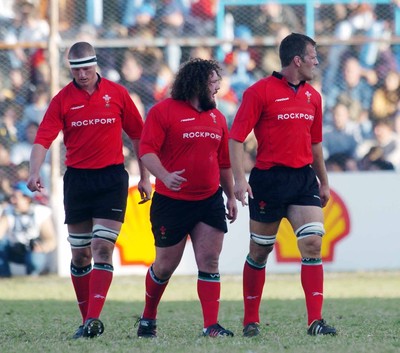 12-06-04. Argentina v Wales (1st Test in Tucuman).  Wales' Brent Cockbain, Adam Jones and Gareth Llewellyn in dejection as the Pumas pile on the points.  