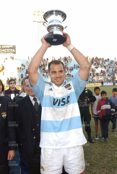 12-06-04. Argentina v Wales (1st Test in Tucuman).  Puma's Captain Gonzalo Longo lofts the test trophy after beating Wales.  
