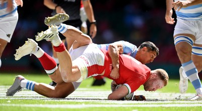 170721 - Argentina v Wales - International Rugby - Ross Moriarty of Wales is tackled by Tomas Cubelli of Argentina