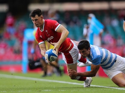 170721 - Argentina v Wales, Summer International Series, Second Test - Tom Rogers of Wales is tackled by Bautista Delguy of Argentina