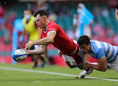 170721 - Argentina v Wales, Summer International Series, Second Test - Tom Rogers of Wales offloads as he is tackled by Bautista Delguy of Argentina