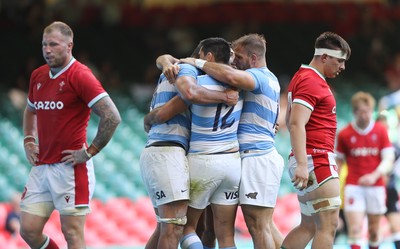 170721 - Argentina v Wales, Summer International Series, Second Test - Pablo Matera of Argentina celebrates with team mates after scoring try as Ross Moriarty of Wales  and Taine Basham of Wales show the disappointment