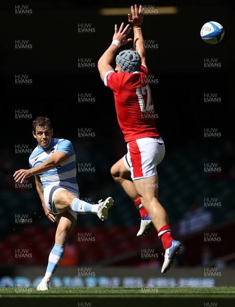 170721 - Wales v Argentina - Summer International Series - Nicolas Sanchez of Argentina attempts a drop goal as Jonathan Davies of Wales charges down