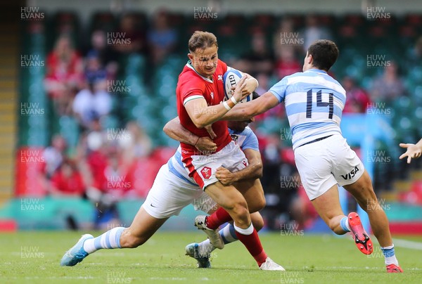 170721 - Argentina v Wales, Summer International Series, Second Test - Hallam Amos of Wales is tackled by the Argentinian defence