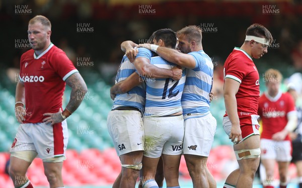 170721 - Argentina v Wales, Summer International Series, Second Test - Pablo Matera of Argentina celebrates with team mates after scoring try as Ross Moriarty of Wales  and Taine Basham of Wales show the disappointment