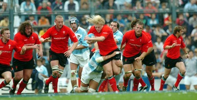 19-06-04. Argentina v Wales (Second Test Buenos Aires)  Wales' Duncan Jones strides though tackle.  