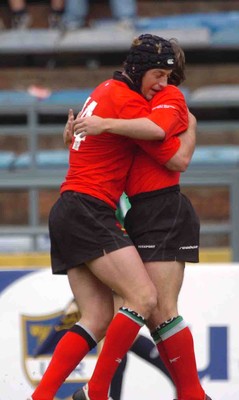 19-06-04. Argentina v Wales (Second Test Buenos Aires)  Wales' Hal Luscombe congratulates Shane Williams on try.  