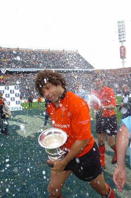 19-06-04. Argentina v Wales (Second Test Buenos Aires)  Wales' Captain Colin Charvis is showered with chamagne by Mike Phillips.  