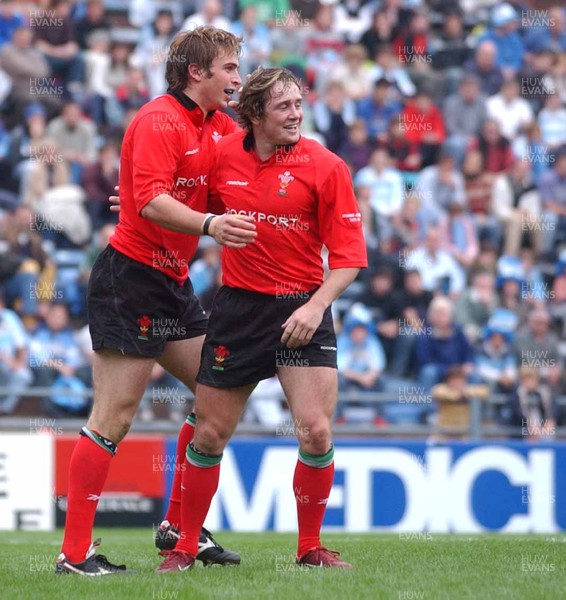 19-06-04. Argentina v Wales (Second Test Buenos Aires)  Wales' Nicky Robinson is congratulated on try by Shane Williams.  