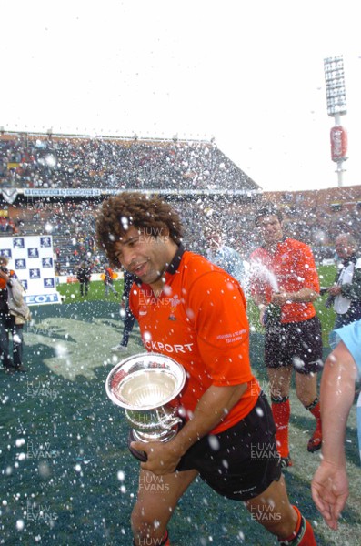 19-06-04. Argentina v Wales (Second Test Buenos Aires)  Wales' Captain Colin Charvis is showered with chamagne by Mike Phillips.  