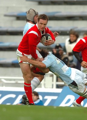 17.06.06. ARGENTINA V WALES,Velez Sarsfield, Buenos Aires  Mark Jones is tackled by Francisco Leonelli.  