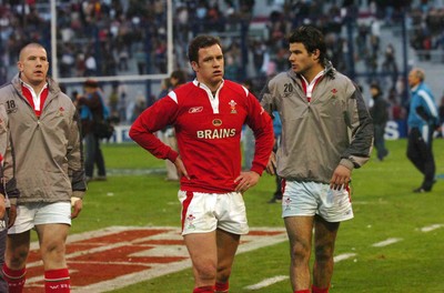 17.06.06. ARGENTINA V WALES,Velez Sarsfield, Buenos Aires  l-r John Yapp, Mark Jones and Mike Phillips leave the field.  