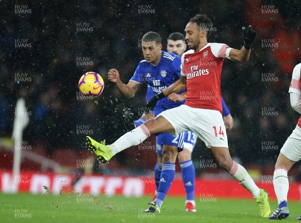 290119 -  Arsenal v Cardiff City, Premier League - Lee Peltier of Cardiff City is challenged by Pierre-Emerick Aubameyang of Arsenal