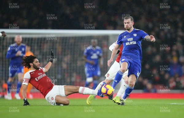 290119 -  Arsenal v Cardiff City, Premier League - Joe Ralls of Cardiff City is challenged by Mohamed Elneny of Arsenal