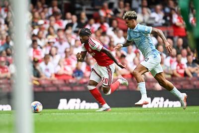 160826 - Arsenal v Manchester City - FA Community Shield - Noni Madueke of Arsenal is challenged by Nico O'Reilly of Manchester City