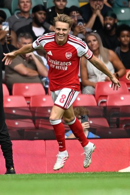 160826 - Arsenal v Manchester City - FA Community Shield - Martin Odegaard of Arsenal celebrates scoring a goal with team mates