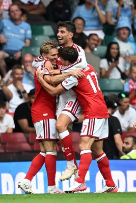 160826 - Arsenal v Manchester City - FA Community Shield - Martin Odegaard of Arsenal celebrates scoring a goal with team mates