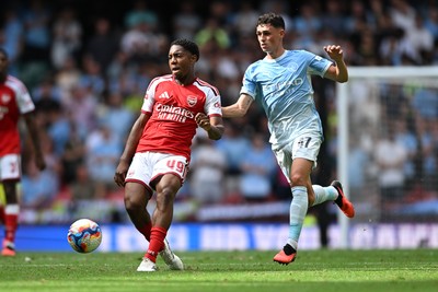 160826 - Arsenal v Manchester City - FA Community Shield - Myles Lewis-Skelly of Arsenal is challenged by Phil Foden of Manchester City