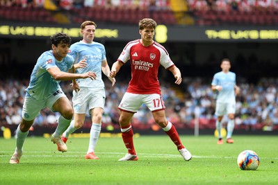 160826 - Arsenal v Manchester City - FA Community Shield - Abdukodir Khusanov of Manchester City is challenged by Christos Tzolis of Arsenal