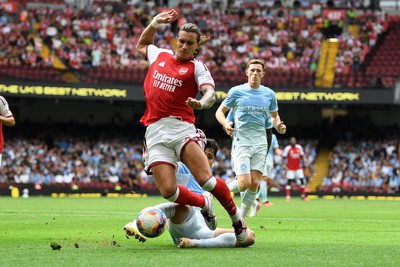 160826 - Arsenal v Manchester City - FA Community Shield - Riccardo Calafiori of Arsenal is tackled by Abdukodir Khusanov of Manchester City