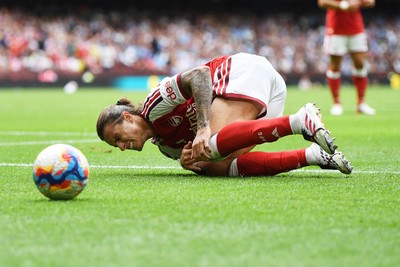 160826 - Arsenal v Manchester City - FA Community Shield - Riccardo Calafiori of Arsenal is tackled by Abdukodir Khusanov of Manchester City
