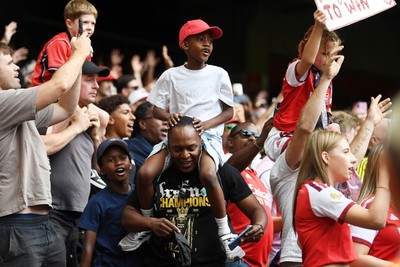 160826 - Arsenal v Manchester City - FA Community Shield - Arsenal fans celebrate the win at full time