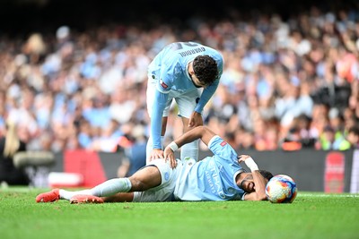 160826 - Arsenal v Manchester City - FA Community Shield - Omar Marmoush of Manchester City goes down injured