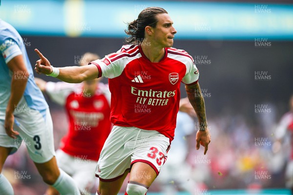 160826 - Arsenal v Manchester City - FA Community Shield - Riccardo Calafiori of Arsenal celebrates scoring a goal