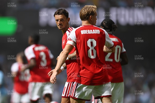 160826 - Arsenal v Manchester City - FA Community Shield - Ben White of Arsenal celebrates with team mates after Riccardo Calafiori of Arsenal scores a goal