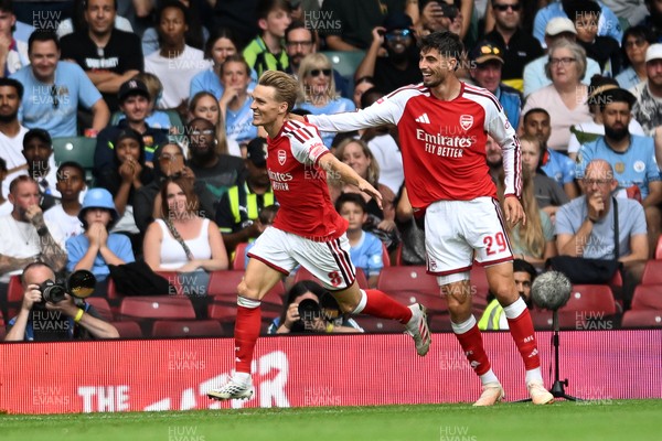 160826 - Arsenal v Manchester City - FA Community Shield - Martin Odegaard of Arsenal celebrates scoring a goal with team mates