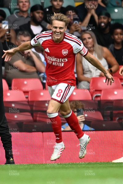 160826 - Arsenal v Manchester City - FA Community Shield - Martin Odegaard of Arsenal celebrates scoring a goal with team mates