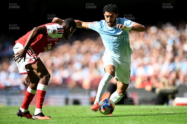 160826 - Arsenal v Manchester City - FA Community Shield - Omar Marmoush of Manchester City is challenged by Gabriel of Arsenal