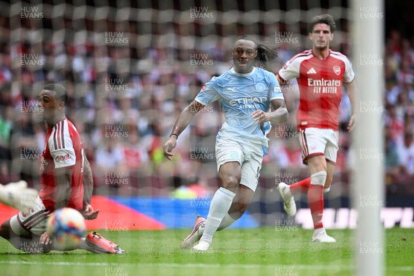 160826 - Arsenal v Manchester City - FA Community Shield - Antoine Semenyo of Manchester City has his shot saved by David Raya of Arsenal