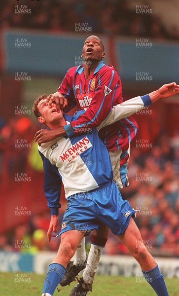 040395 - Aston Villa v Blackburn Rovers - Premier League - Ugo Ehiogu of Villa gets above Chris Sutton