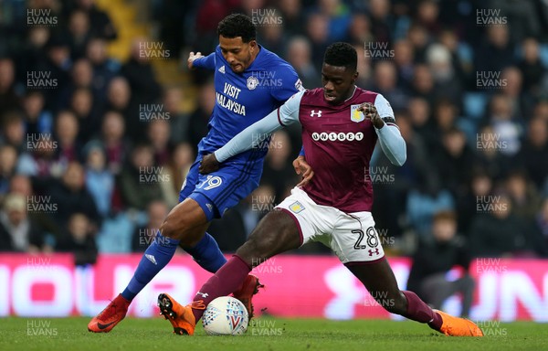 100418 - Aston Villa v Cardiff City - SkyBet Championship - Nathaniel Mendez-Laing of Cardiff City is tackled by Axel Tuanzebe of Aston Villa