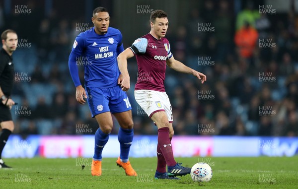 100418 - Aston Villa v Cardiff City - SkyBet Championship - James Chester of Aston Villa is challenged by Kenneth Zohore of Cardiff City