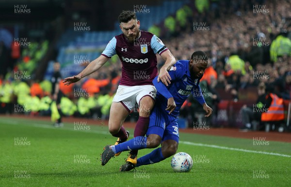 100418 - Aston Villa v Cardiff City - SkyBet Championship - Junior Hoilett of Cardiff City is tackled by Robert Snodgrass of Aston Villa who receives a yellow card