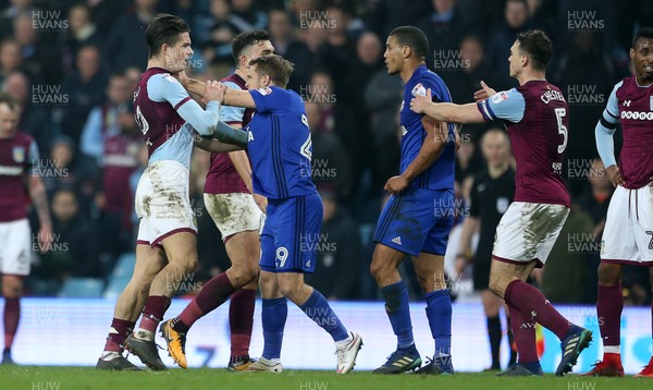 100418 - Aston Villa v Cardiff City - SkyBet Championship - Tempers fly between Jack Grealish of Aston Villa with Jamie Ward and Lee Peltier of Cardiff City