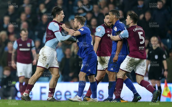 100418 - Aston Villa v Cardiff City - SkyBet Championship - Tempers fly between Jack Grealish of Aston Villa with Jamie Ward and Lee Peltier of Cardiff City